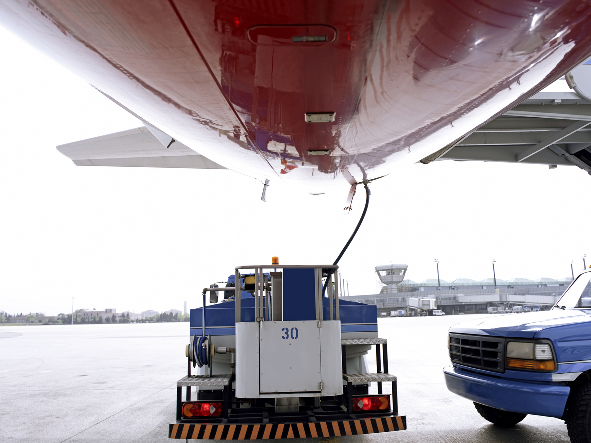 airplane taking ground service on airport platform